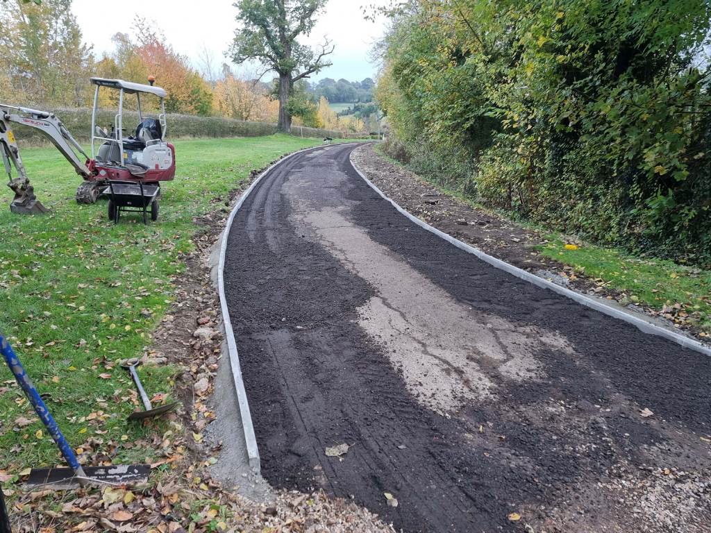 This is a large driveway which is in the process of having a tar and chip driveway installed on by Stowmarket Driveway Services