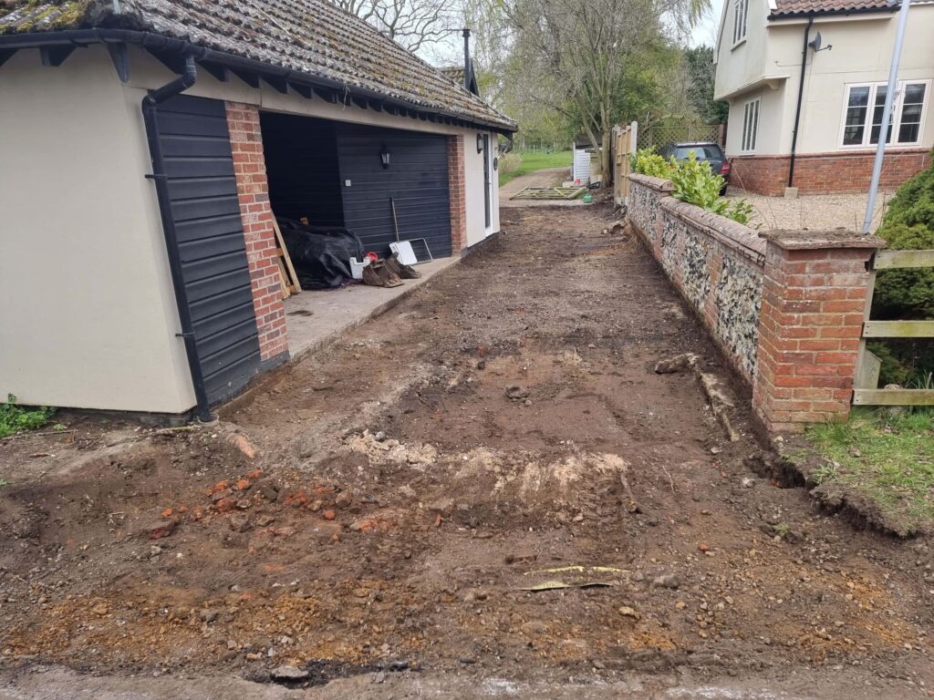 This is a tarmac driveway that is in the process of being dug out and installed by Stowmarket Driveway Services